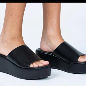 Princess Polly lower impact Britta platform slides black size 8. New